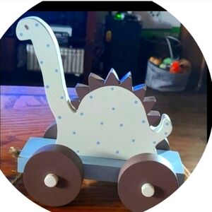 Blue dotted dinosaur wooden pull toy